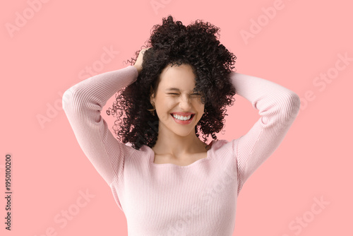 Beautiful young woman in cu...