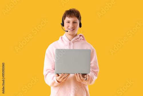 Young man in headset with l...