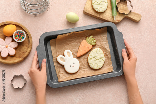 Woman holding baking dish w...