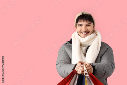 Young man in winter clothes...