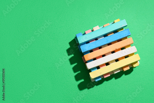 Pieces of colorful chalks o...
