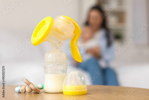 Breast pump and rattle on t...