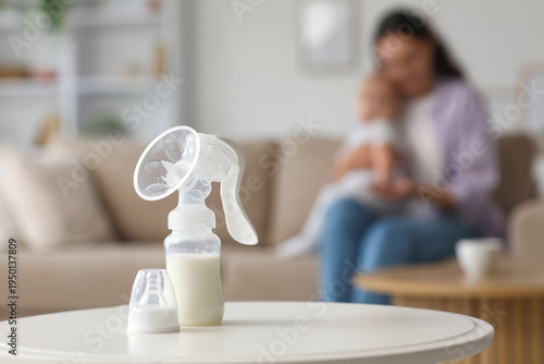 Breast pump on table agains...