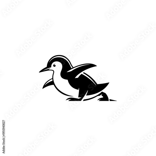 A black and white vector illustration of a cute penguin sliding on its belly. This clean, minimalist flightless bird silhouette is ideal for winter-themed logos and mascots.