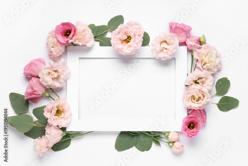 Paper frame with beautiful flowers on white background