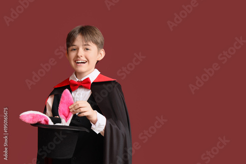 Little magician and hat wit...