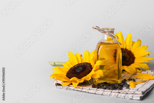 Bottle of oil with sunflowe...