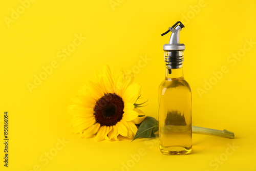 Bottle of oil with sunflowe...