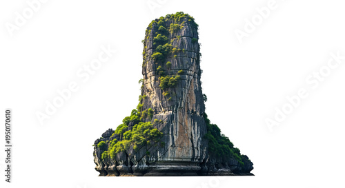 Photos Jagged rock formation covered in lush green vegetation isolated