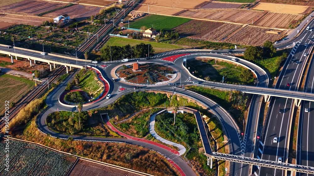 Weird Complex Roudabout Complex road roundabout and highway interchange. Wide drone shot of a ...
