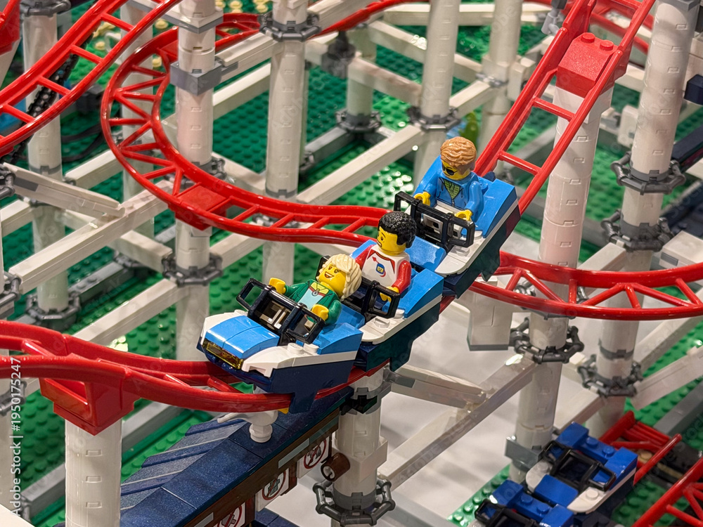 Fototapeta premium Lego roller coaster car with three minifigures