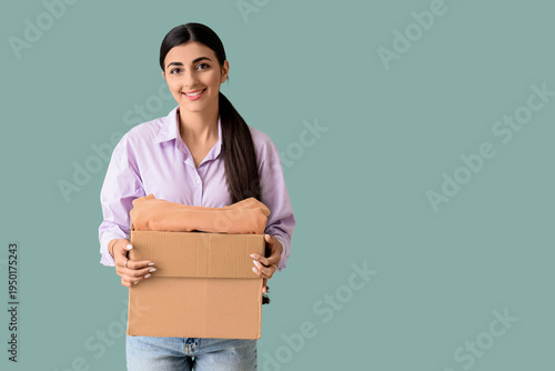 Young woman with wardrobe b...