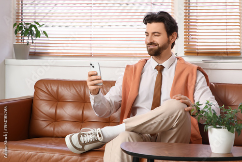 Handsome businessman workin...