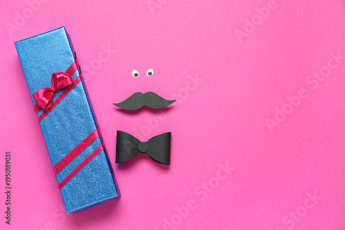 Gift box with paper moustac...