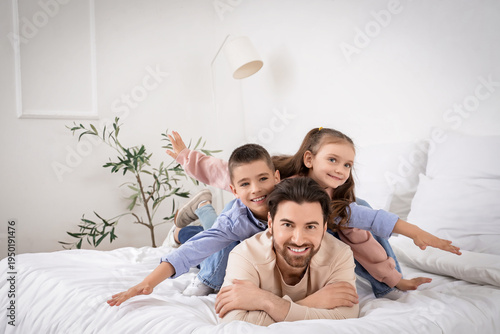 Happy father with his littl...