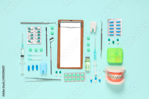 Blank clipboard with pills,...