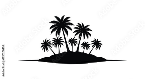 Tropical island with several palm trees in dark silhouette