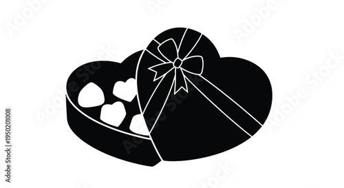 Open heart shaped chocolate box with candies a striking silhouette