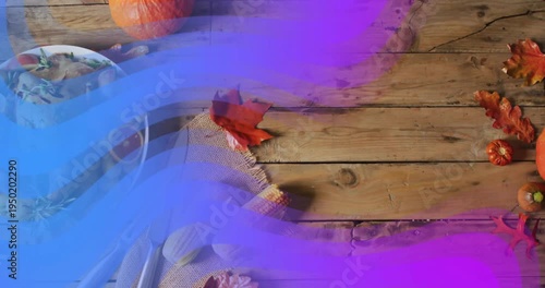 Roasted turkey with vegetables on Thanksgiving dinner table, colorful wave animation