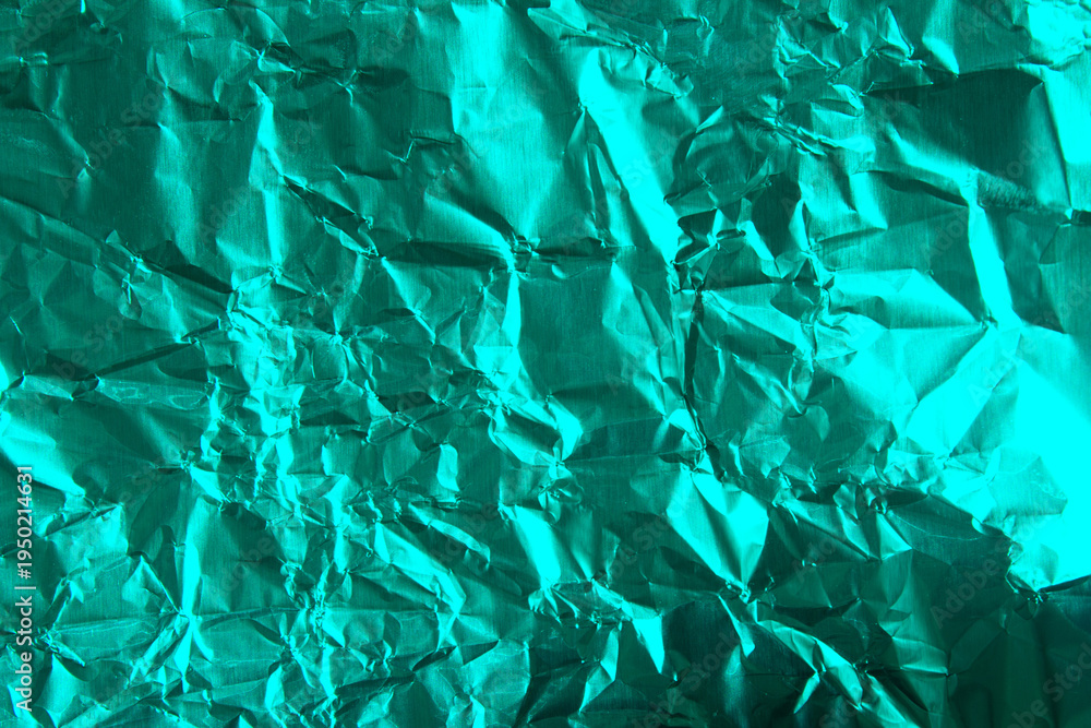 Obraz premium Turquoise Crumpled Foil Texture Background Metallic Wrinkled Aluminium Surface Abstract Shiny Material