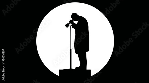 A silhouette of a person using a microscope within a bright circle on a black background