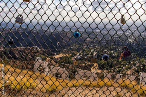 Los Angeles view through fence with love locks