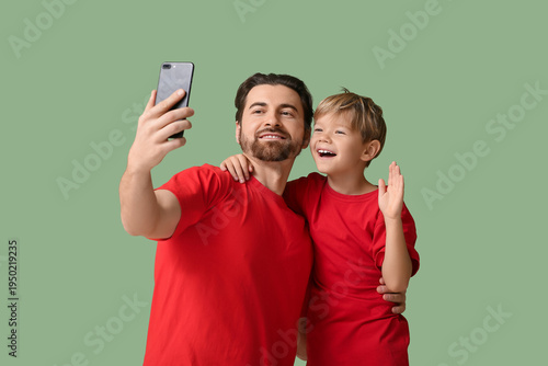 Dad and his son taking self...