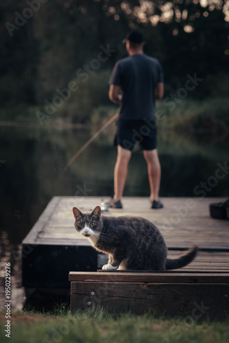 man and cat