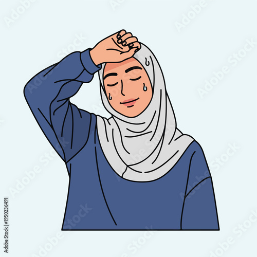 Woman in hijab wiping sweat from forehead in relief