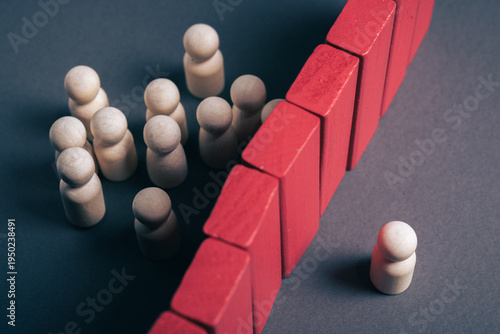 Foto Exclusion concept with isolated individual outside group barrier