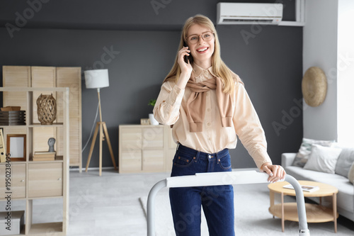 Young businesswoman talking...