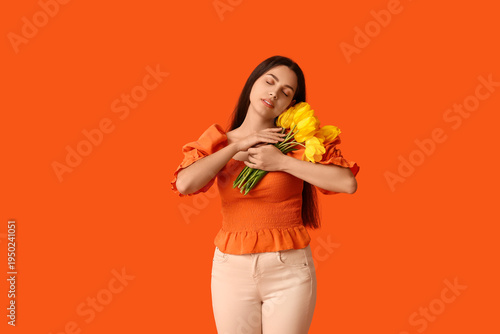 Beautiful young woman with ...