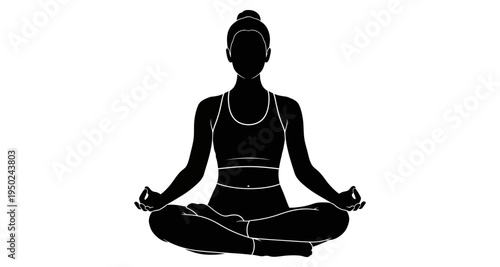 Silhouette of a woman practicing yoga in a meditative seated posture