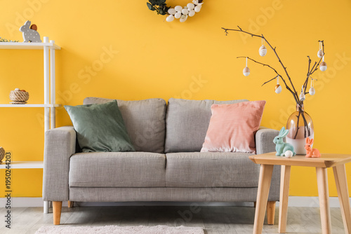 Vase with tree branches and...