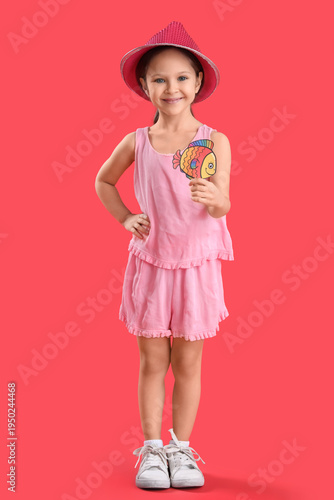 Cute little girl with paper...