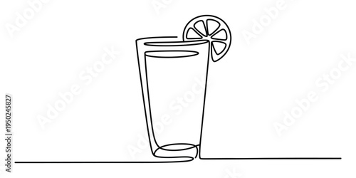 A single continuous line drawing of a refreshing tall glass filled with juice and lemon garnish
