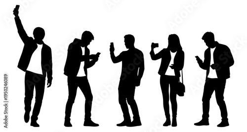 Silhouettes of people engrossed with their smartphones in a public space