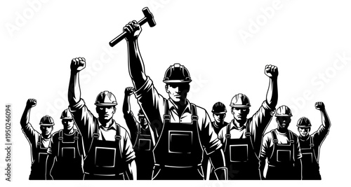 A group of workers raise their fists in a show of solidarity