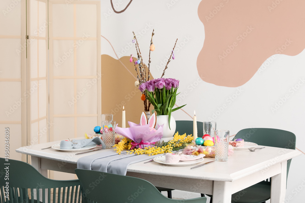 Obraz premium Interior of festive dining room with Easter table setting