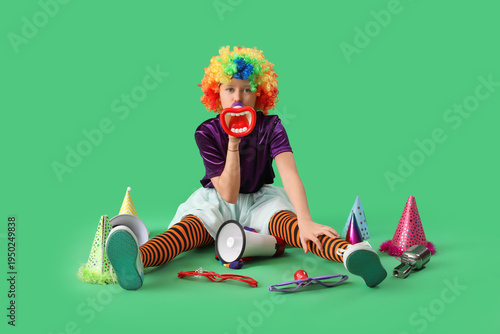 Funny girl in clown costume...