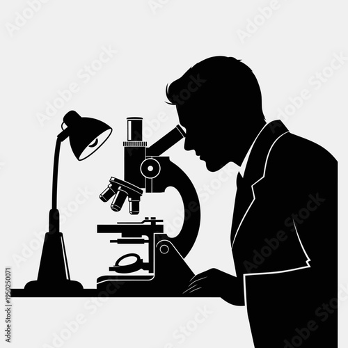 Scientist looking through microscope in laboratory with desk lamp