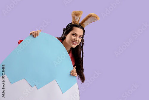 Beautiful woman in bunny ea...