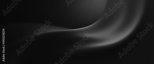 The black background with fine folds in the image creates the illusion of fabric falling or blowing dynamically in the wind.