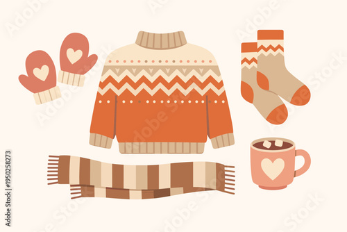 Cozy winter essentials: knitted sweater, mittens, socks, scarf, and hot cocoa on beige background