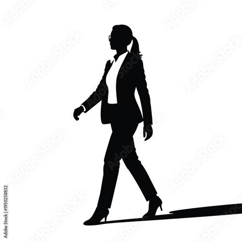 Silhouette of a business woman walking forward with determined stride