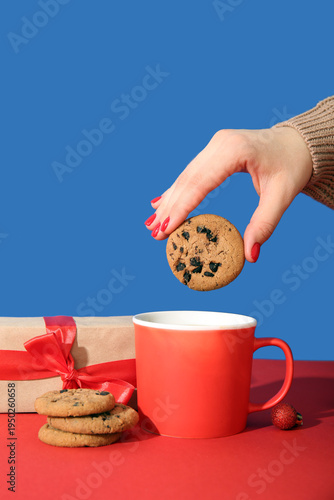 Female hand with red manicu...