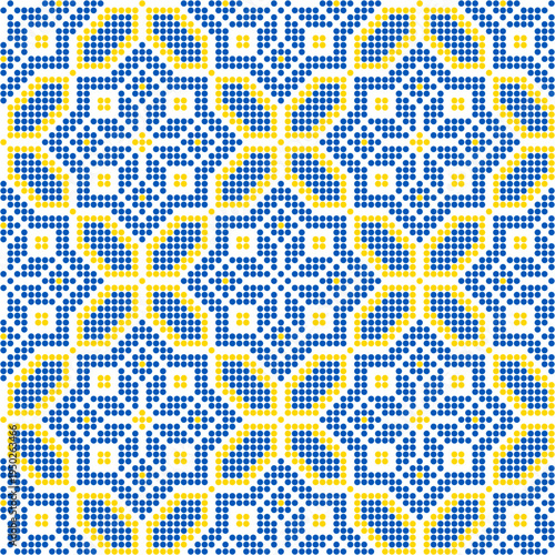Seamless Ukrainian embroidery vector pattern inspired by traditional vyshyvanka ornament. Ethnic geometric folk design made in cross stitch style with yellow and blue stitches