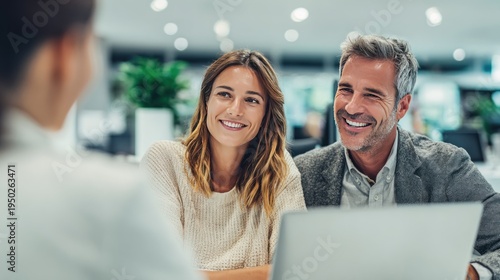 Couple consulting with financial advisor