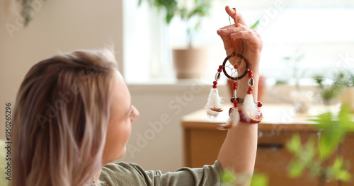 Woman with dream catcher at...