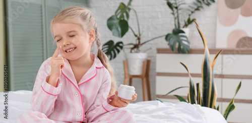 Cute little happy girl in p...